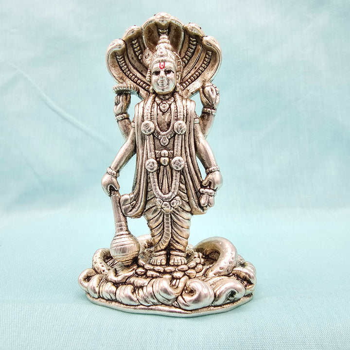 Silver vishnu idol