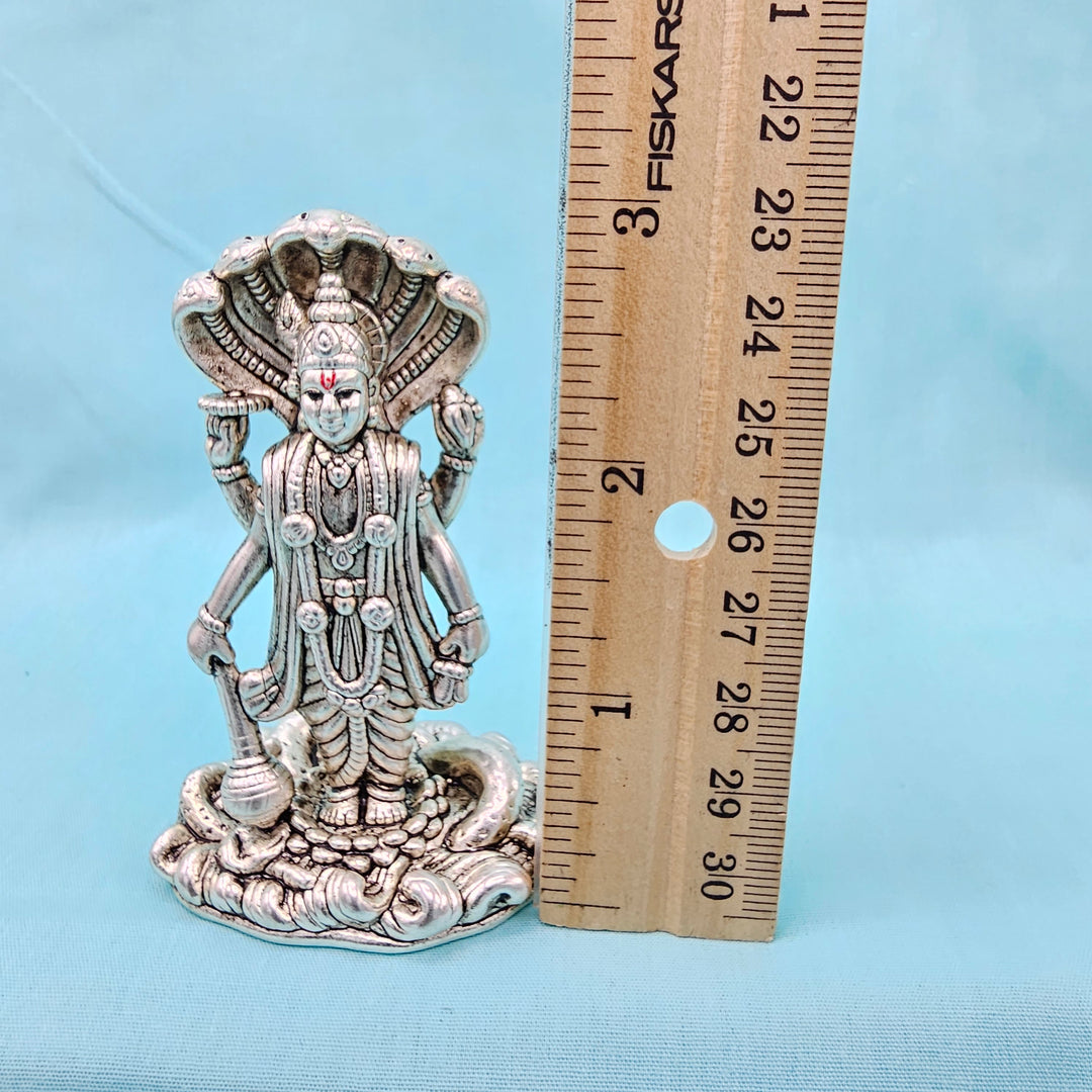 Silver vishnu idol