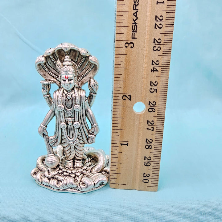 Silver vishnu idol