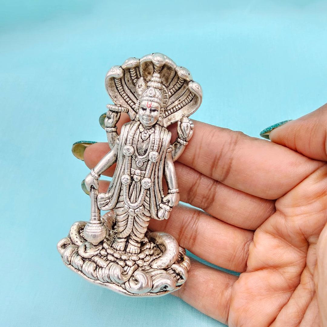 Silver vishnu idol