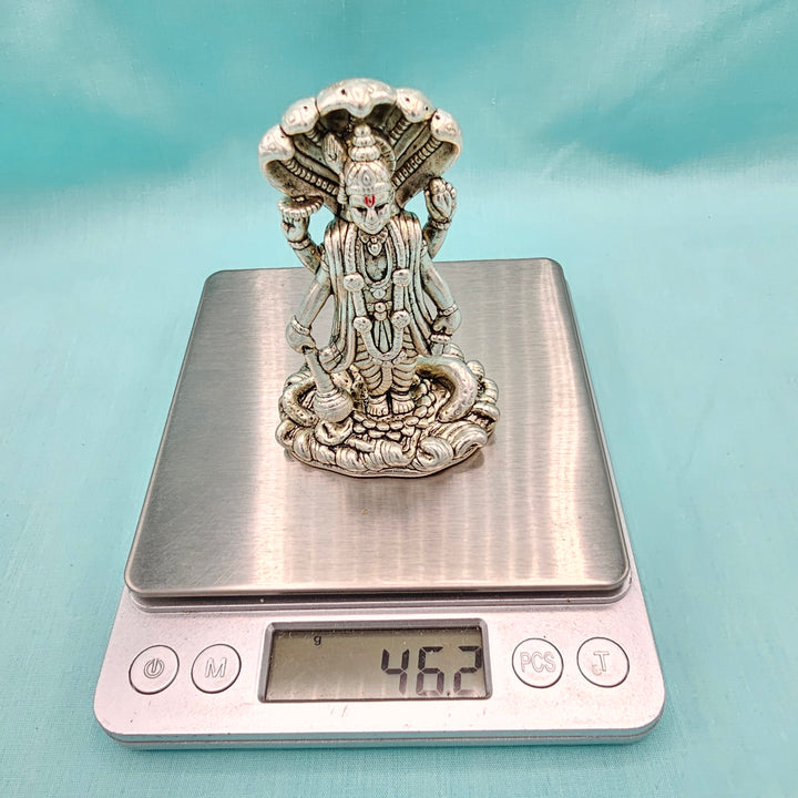 Silver vishnu idol