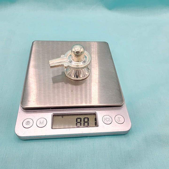 Silver Shiva lingam