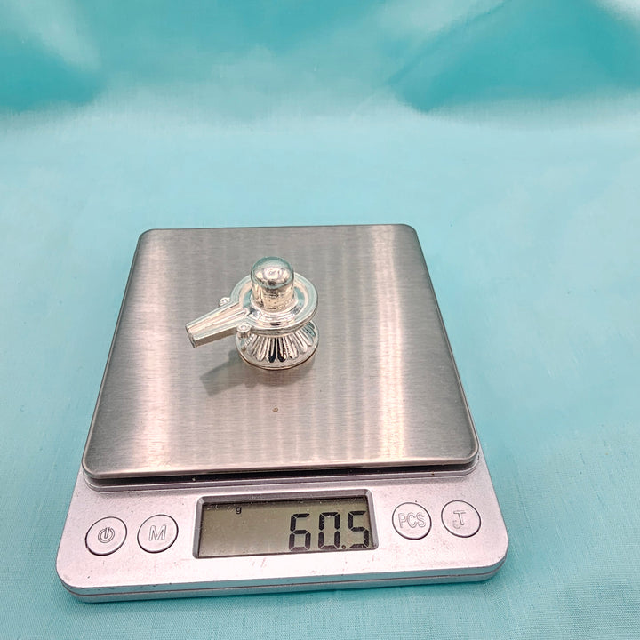 Silver Shiva lingam