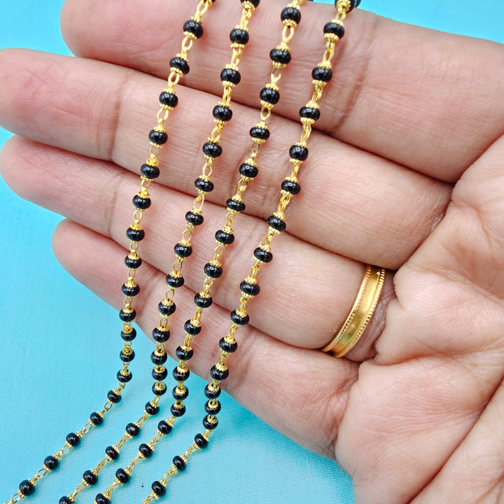 16-18" Black beads W/ Caps