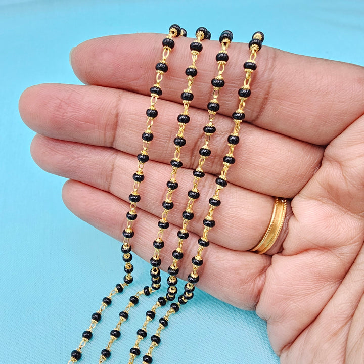 16-18" Black beads W/ Caps