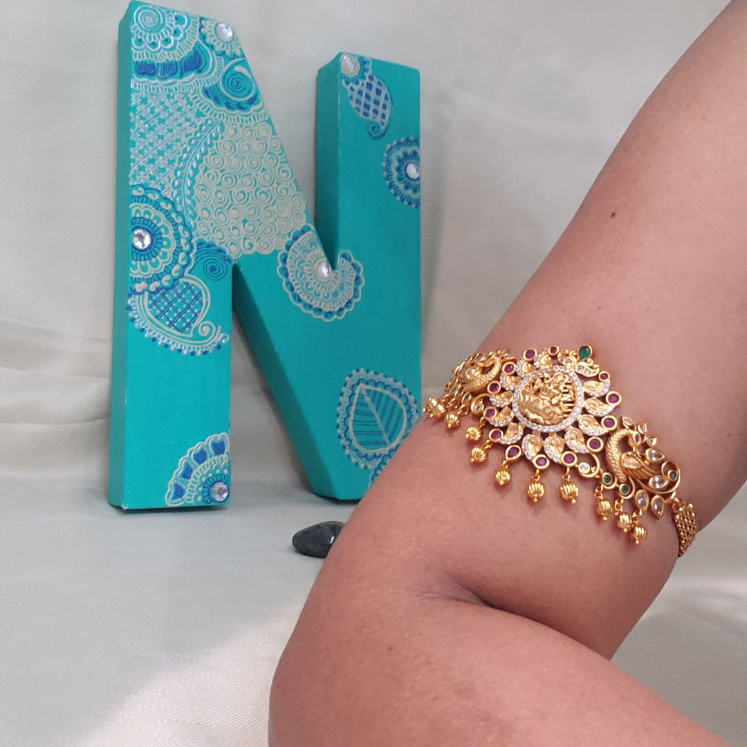 Peacock armlet