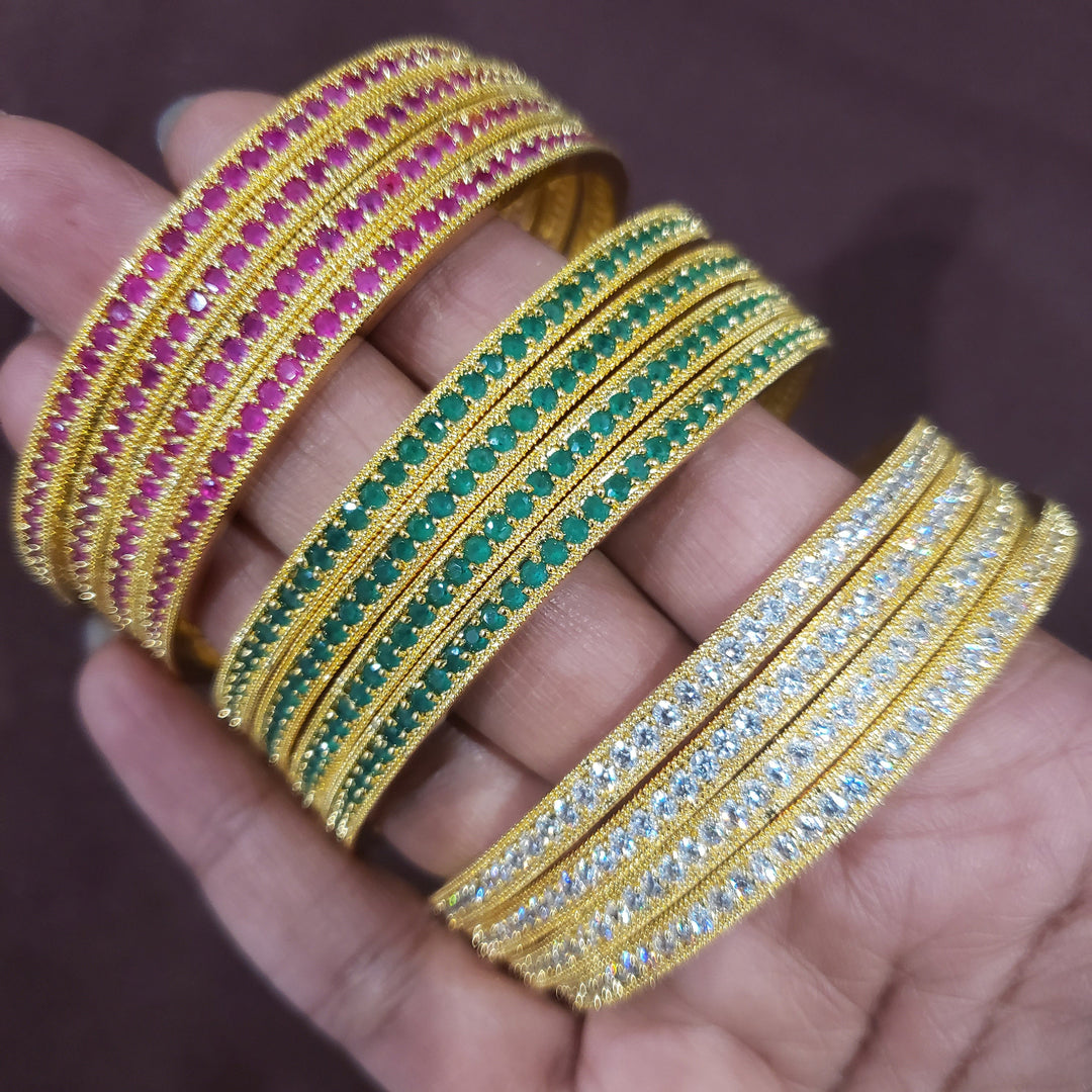 Pink stone bangles.