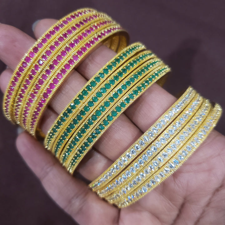 Pink stone bangles.