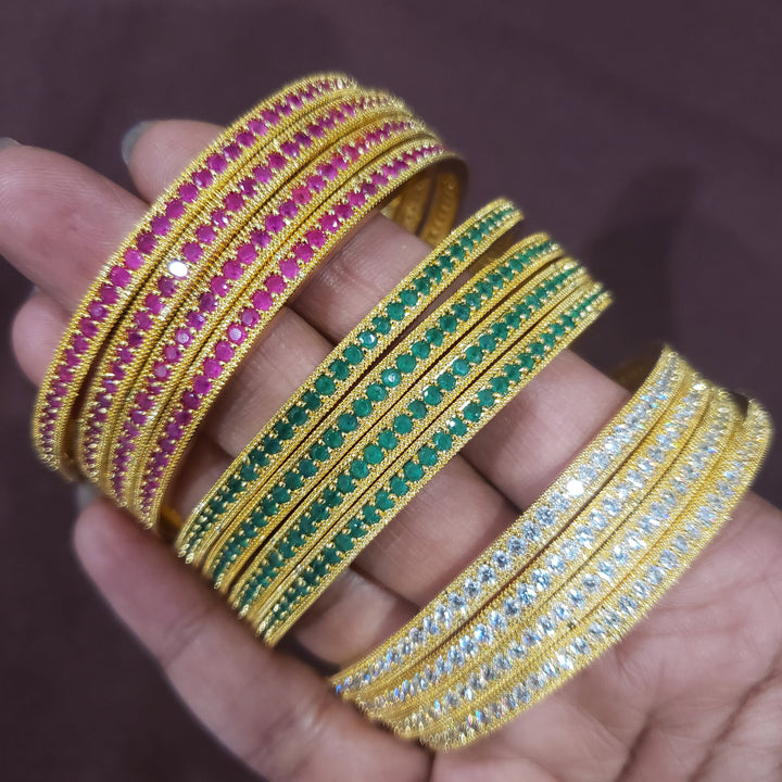Pink stone bangles.