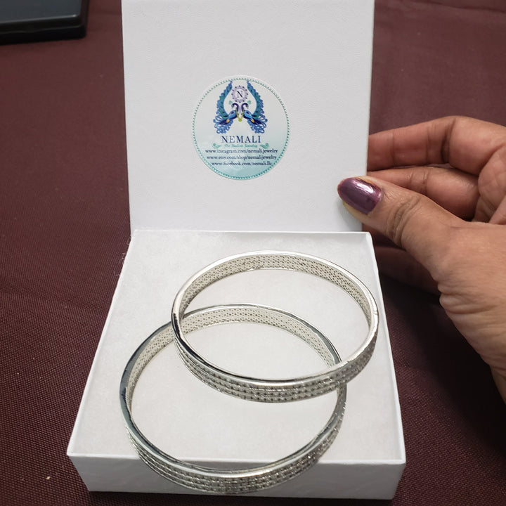 sILVER TONE BANGLES