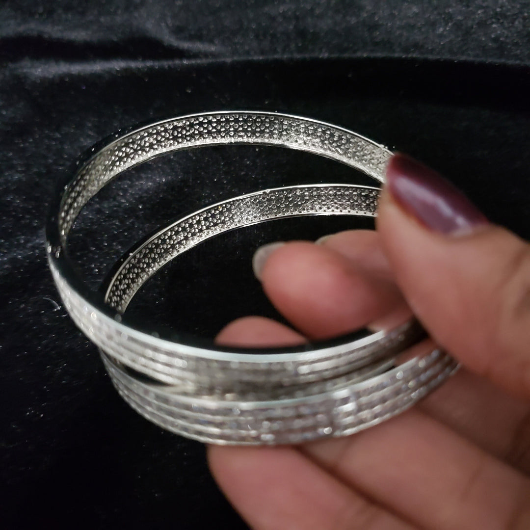 sILVER TONE BANGLES