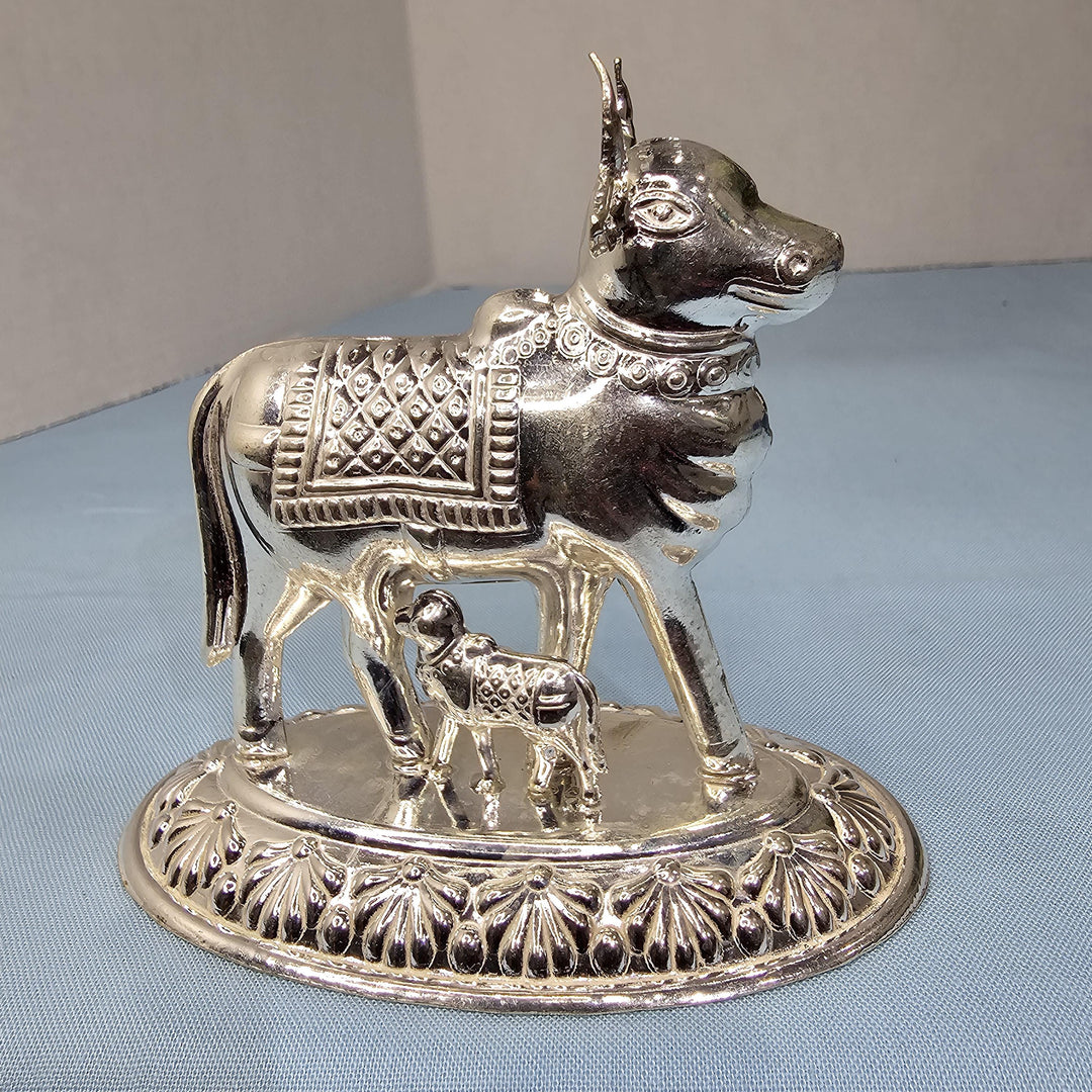 Silver cow calf idol