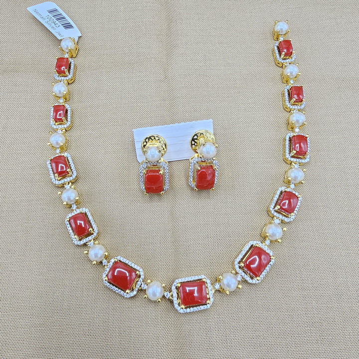 coral diamond rep necklace