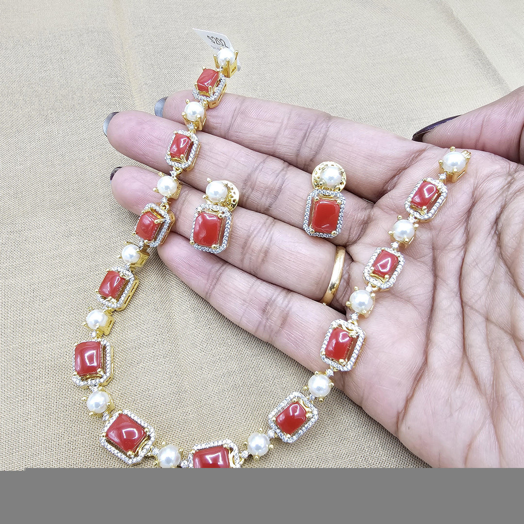 coral diamond rep necklace