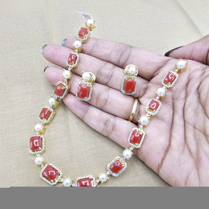 coral diamond rep necklace
