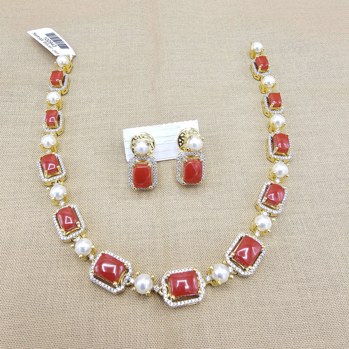 coral diamond rep necklace