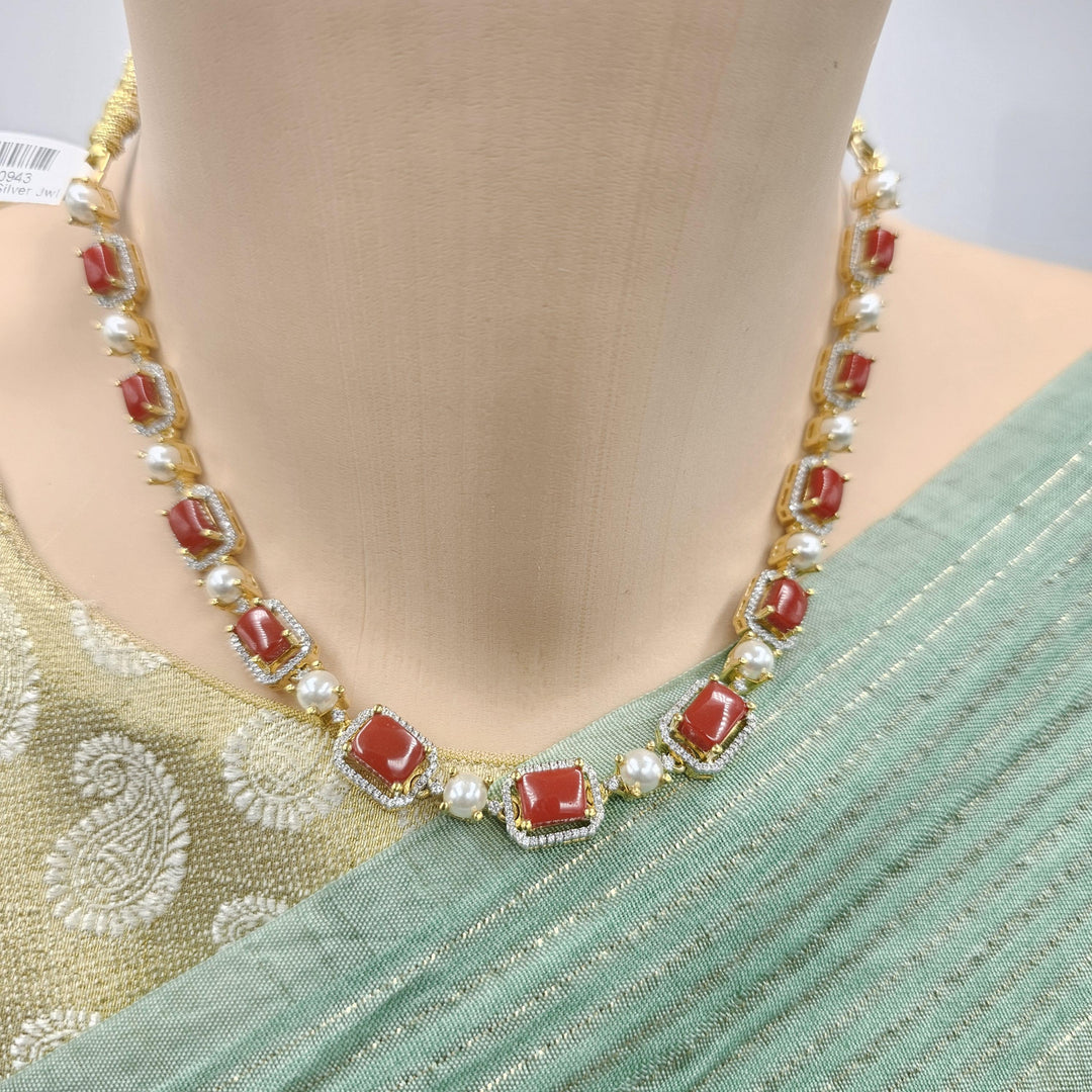 coral diamond rep necklace