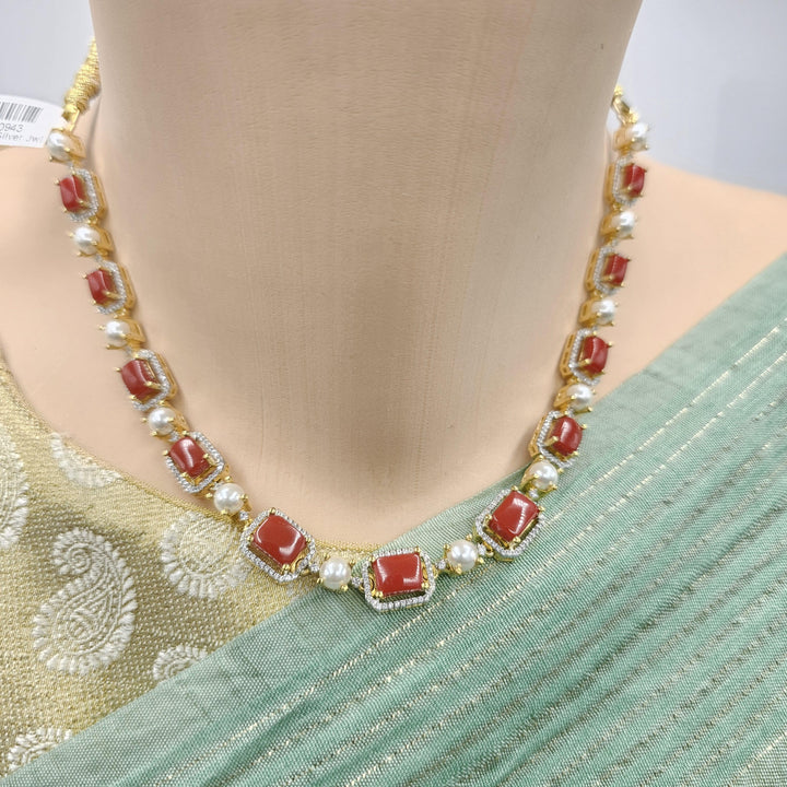 coral diamond rep necklace