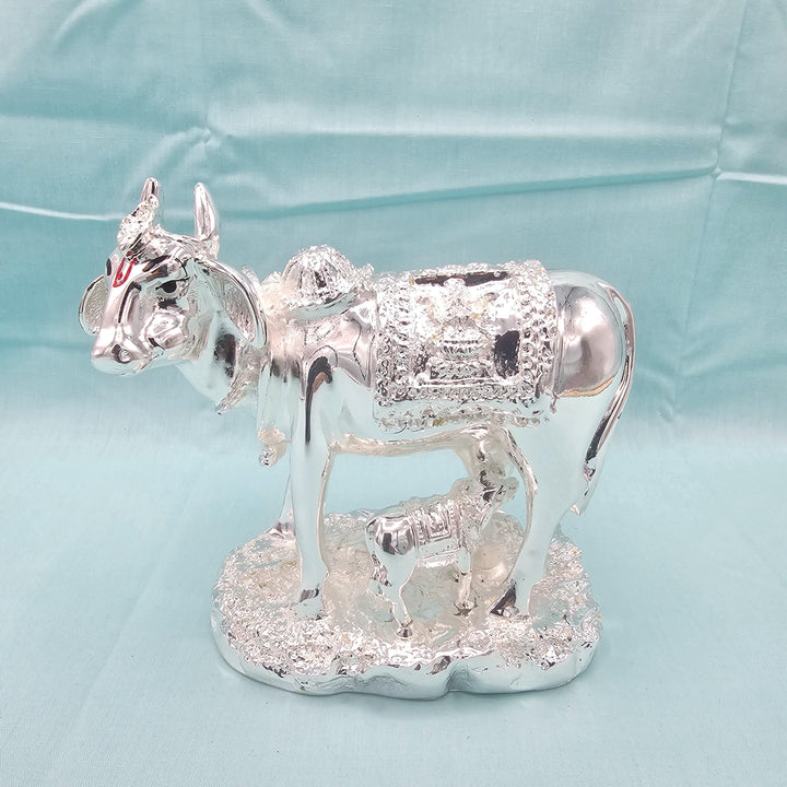 Silver cow and calf idol
