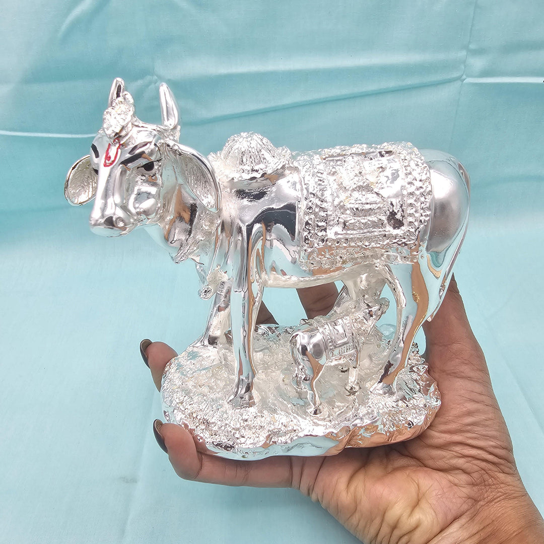 Silver cow and calf idol