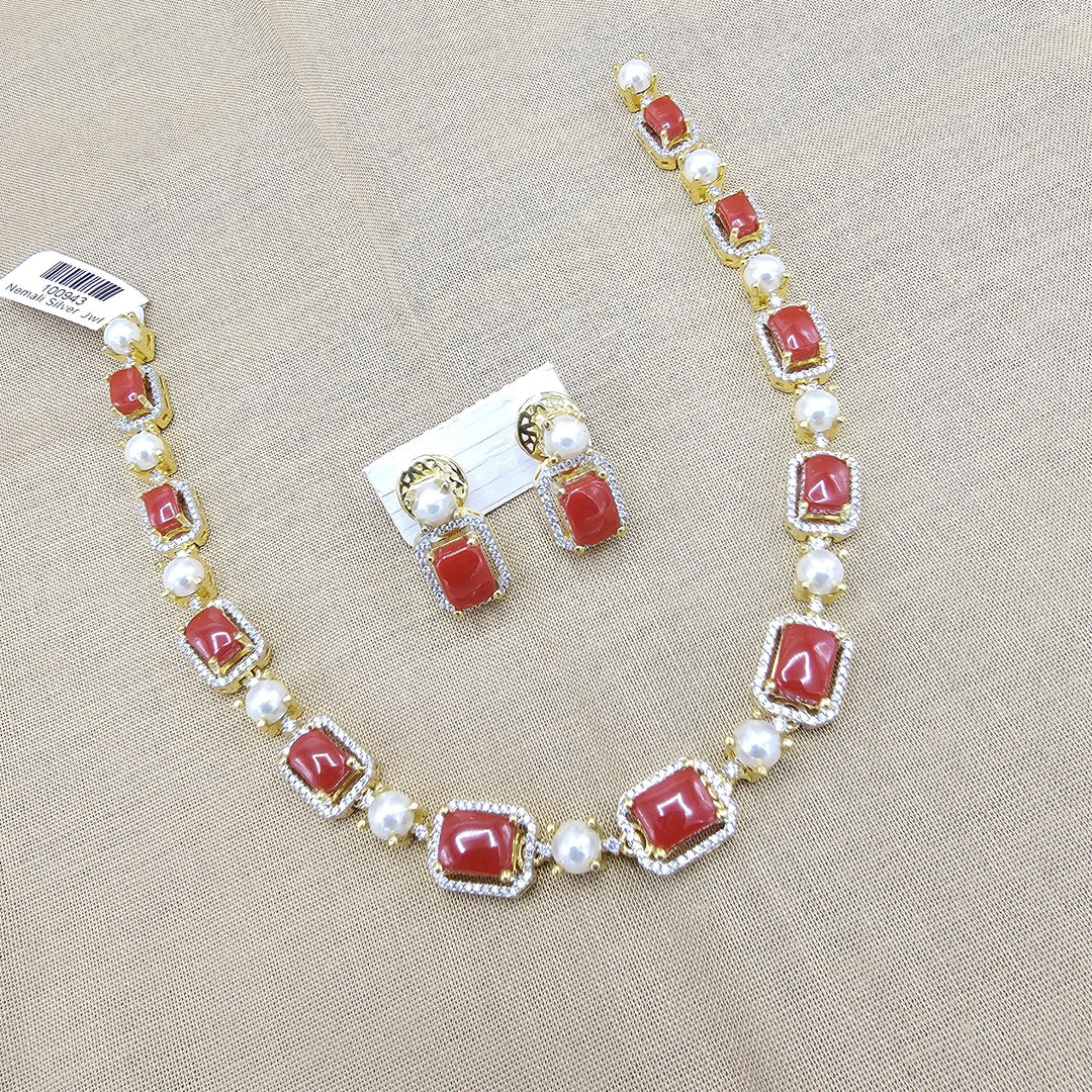 coral diamond rep necklace