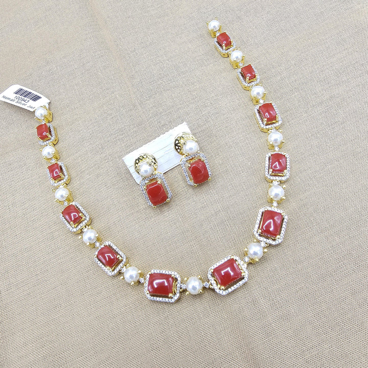 coral diamond rep necklace