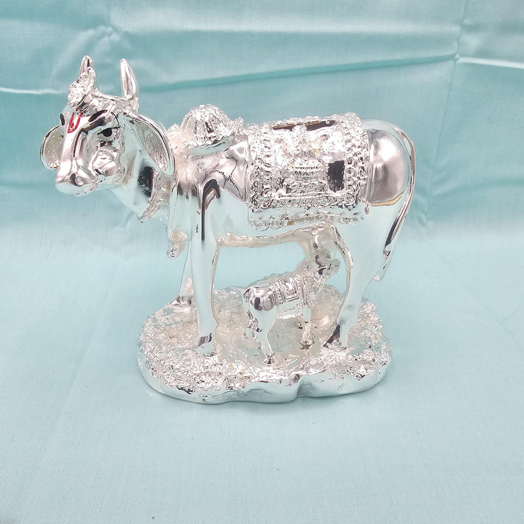 Silver cow and calf idol