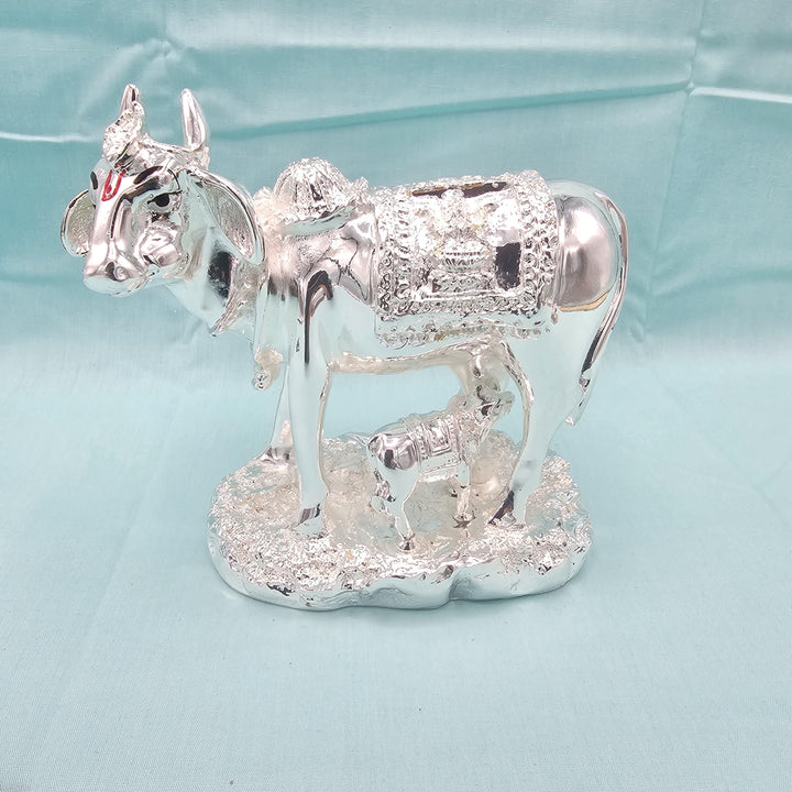 Silver cow and calf idol