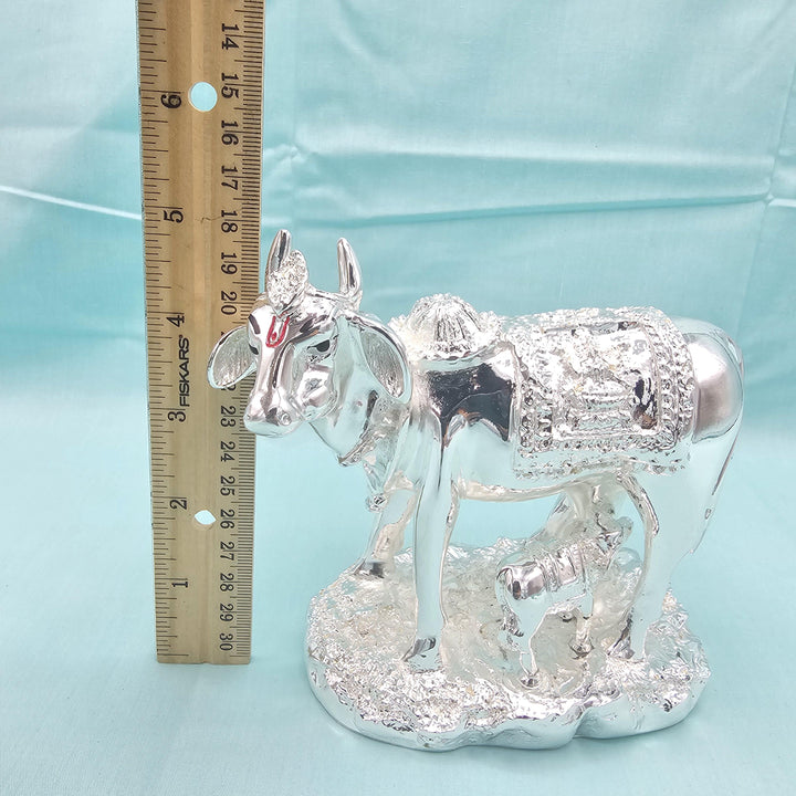 Silver cow and calf idol